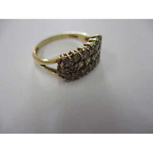 6 - A 9ct yellow gold dress ring set with 19CZ in three rows, approx. ring size L approx. weight 2.6g