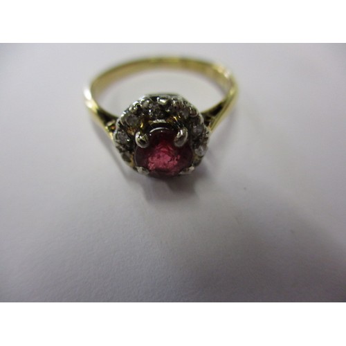 10 - An 18ct yellow gold and platinum diamond and ruby Daisy ring, approx. ring size J ½ approx. weight 2... 