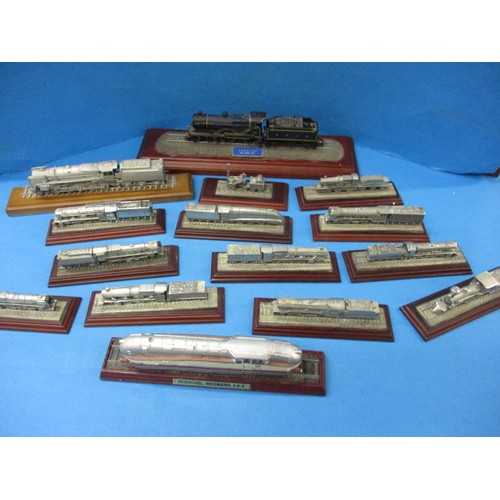 334 - A very large quantity of static model railway loco’s, some cast pewter and on plinths, some dust and... 