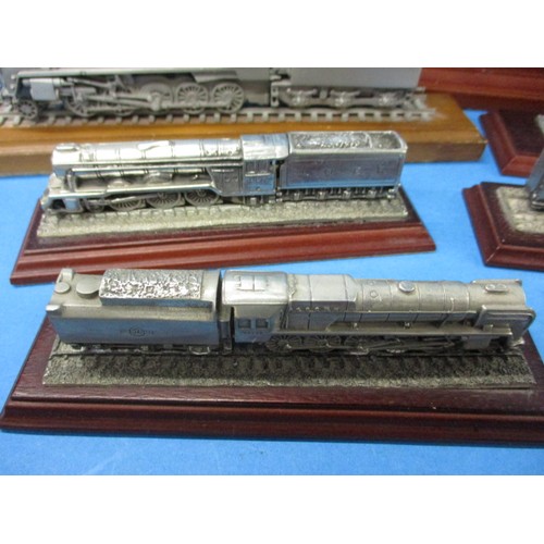 334 - A very large quantity of static model railway loco’s, some cast pewter and on plinths, some dust and... 