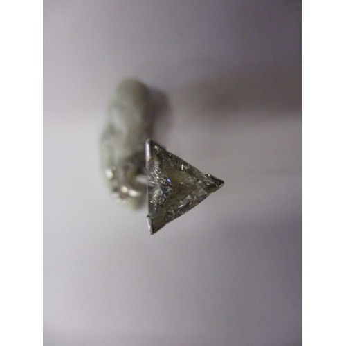 63 - A pair of vintage triangular diamond earrings, un-marked but believed to be on platinum, both in goo... 