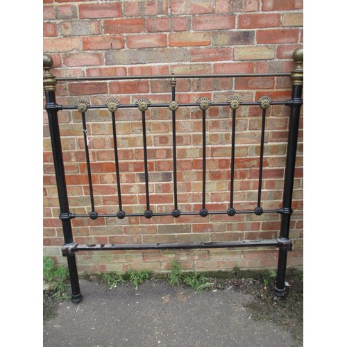 343 - An antique brass and iron double bed frame, in good useable condition with use related marks and one... 