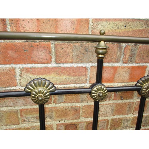 343 - An antique brass and iron double bed frame, in good useable condition with use related marks and one... 