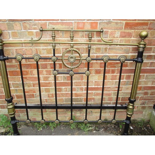 343 - An antique brass and iron double bed frame, in good useable condition with use related marks and one... 