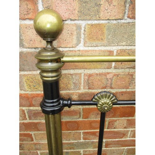 343 - An antique brass and iron double bed frame, in good useable condition with use related marks and one... 