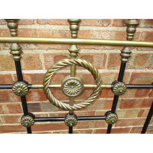 343 - An antique brass and iron double bed frame, in good useable condition with use related marks and one... 