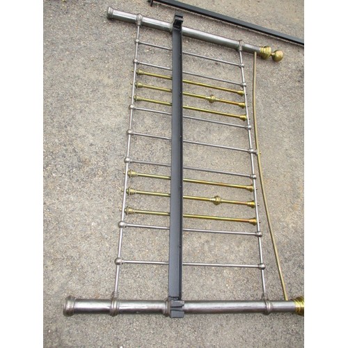 342 - A vintage polished iron and brass double bed frame, in good useable condition with use related marks... 