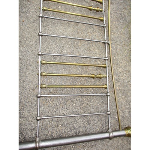 342 - A vintage polished iron and brass double bed frame, in good useable condition with use related marks... 