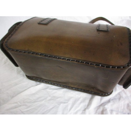 182 - A leather shooting cartridge accessory  bag, in good used condition with working closures, approx. l... 