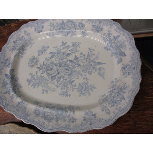 209 - A quantity of 19th century Blue & White platters, most in the Asiatic pheasant design, includes a tu... 