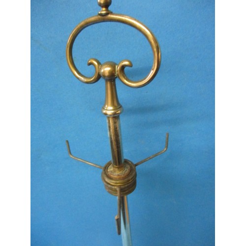 219 - An early 20th century brass 4 branch candle stick, having been converted to electric but needs a rew... 