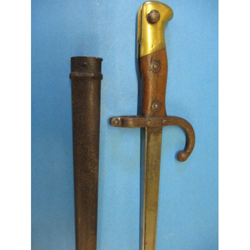 175 - 4 Late 19th early 20th century bayonets, 3 with scabbards, all in reasonable condition with some lig... 