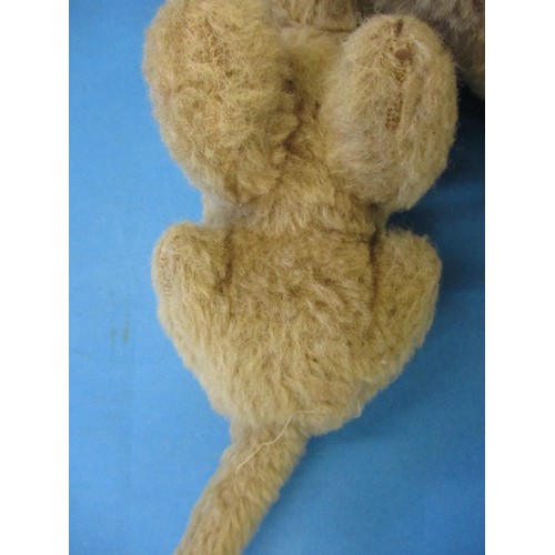 152 - A 1920s plush lioness and cub, with some minor loss to fur and a loosely attached tail, approx. leng... 