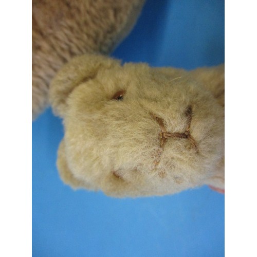 152 - A 1920s plush lioness and cub, with some minor loss to fur and a loosely attached tail, approx. leng... 