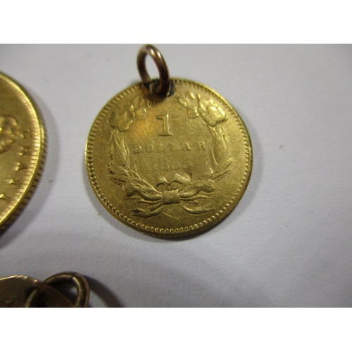 83 - An 1874 half sovereign an 1855 gold American 1 Dollar and an 1870 ½ Dollar, approx. parcel weight 6.... 