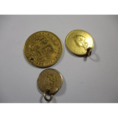 83 - An 1874 half sovereign an 1855 gold American 1 Dollar and an 1870 ½ Dollar, approx. parcel weight 6.... 