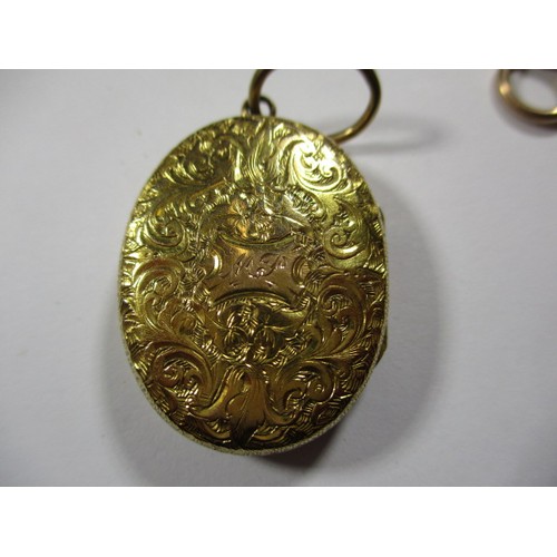 29 - A Victorian unmarked gold necklace chain with yellow metal mourning hair locket, approx. parcel weig... 