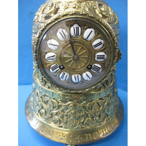 185 - A continental brass bell shaped mantle clock, an unusual piece with lattin inscriptions, runs when w... 