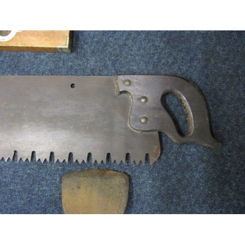 224 - A large 19th century ‘ripping’ saw, approx. length 135cm an axe a pair of 24” stilsons and a spirit ... 