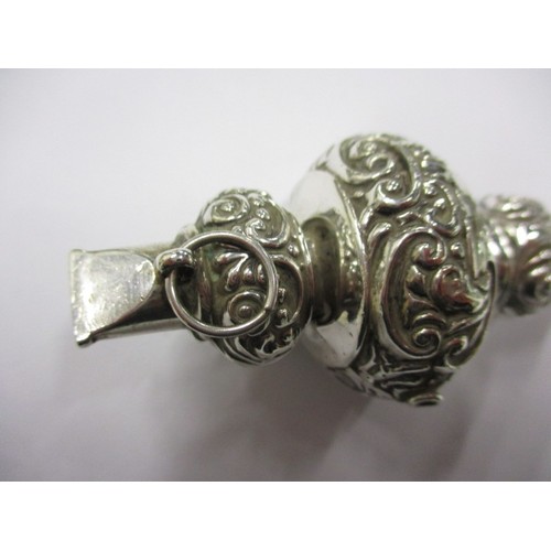 113 - An Edwardian sterling silver baby rattle with whistle, missing bells and some denting, approx. weigh... 