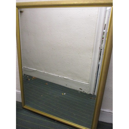 242 - A gilt framed bevelled glass wall mirror, approx. dimensions 110x85cm, in good clean condition