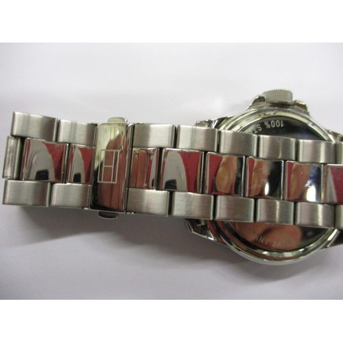 76 - A Tommy Hilfiger water resistant 3 ATM watch with date window, in working order and good pre-owned c... 