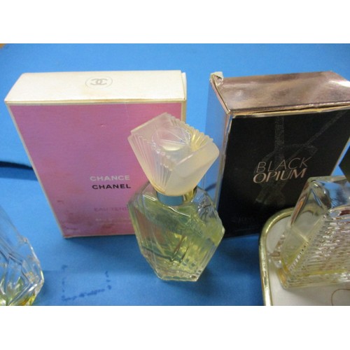 228 - A collection of vintage perfume in bottles, to include an example by Chanel, all in pre-owned condit... 