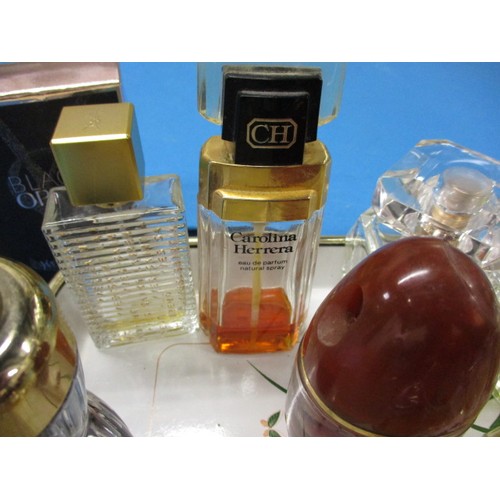 228 - A collection of vintage perfume in bottles, to include an example by Chanel, all in pre-owned condit... 