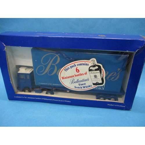 289 - A die-cast model of Ballantines scotch whisky lorry with cargo of 6 miniature bottles, in un-opened ... 