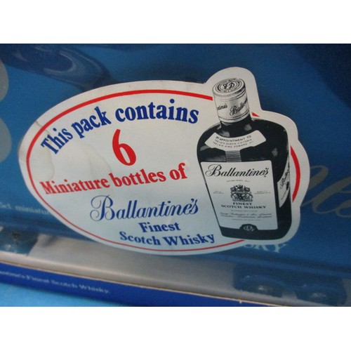 289 - A die-cast model of Ballantines scotch whisky lorry with cargo of 6 miniature bottles, in un-opened ... 