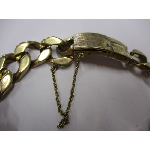 42 - A gents 9ct yellow gold flat curb link bracelet, approx. weight 88g having name to front panel, with... 