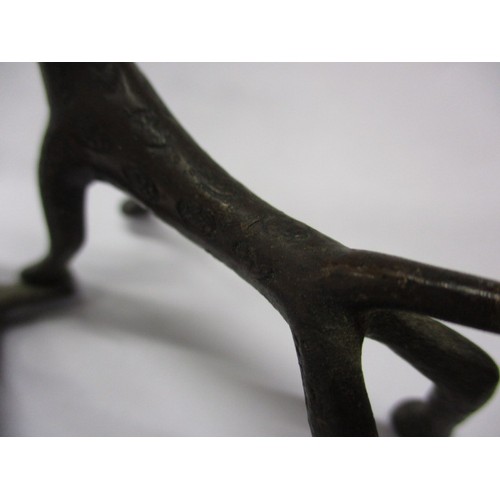 129 - A mid-20th century African bronze sculpture of a hunting man with his dog, approx. height 11cm