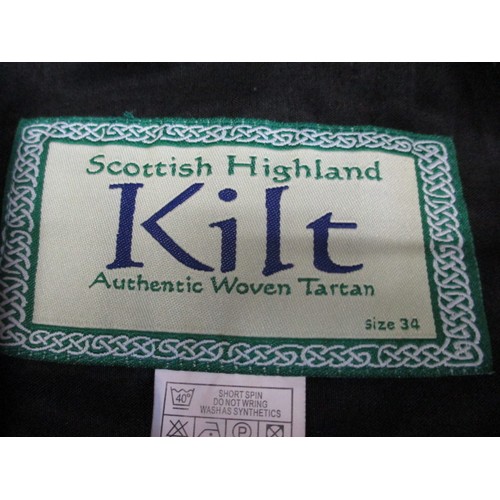 234 - Two Scottish Highland kilts, each in a different woven tartan, in good pre-owned condition