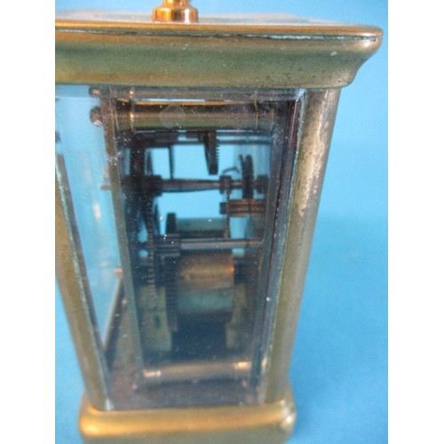 190 - A vintage brass 5 glass carriage clock, in current working order, enamel dial has a crack and genera... 