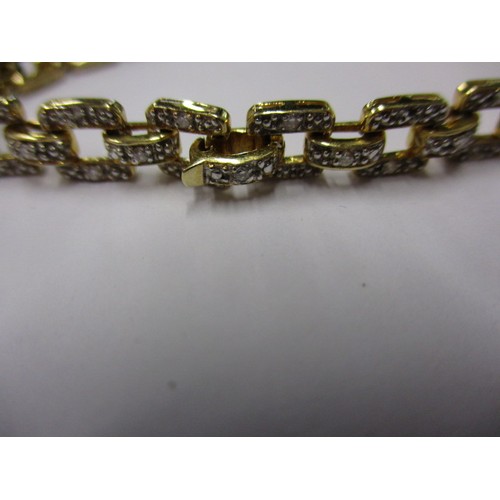 46 - An 18ct yellow gold and diamond bracelet, approx. linear length 16.5cm approx. weight 11.8g in good ... 