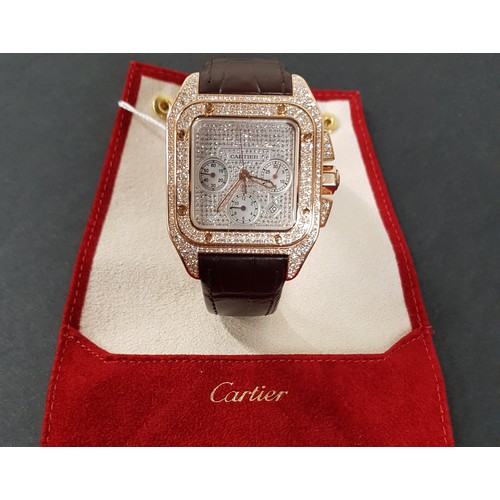 67 - A Cartier 18k pink gold automatic chronograph large Santos 100 watch model 2935, having numerous dia... 