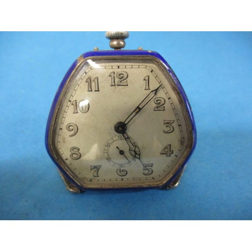 68 - A 1930’s art deco watch with silver and blue enamel body, of pendant form converting to stand. Initi... 