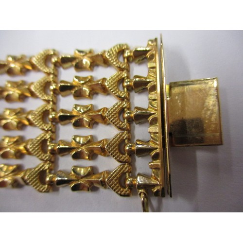 45 - An 18ct yellow gold gate bracelet, approx. weight 30.7g approx. linear length 18cm in original retai... 