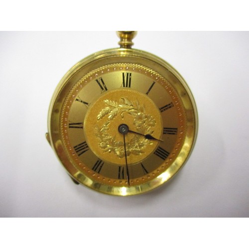 65 - A continental 18ct gold cased fob watch. No key, but believed to be in good working order, with age ... 