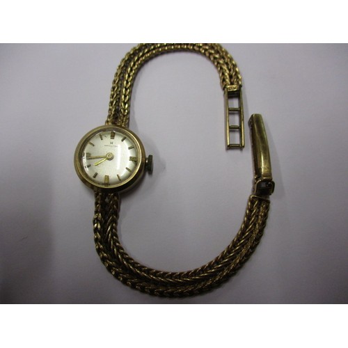 66 - A vintage 9ct gold ladies cocktail watch by Hamilton, having gold mesh strap, approx. weight 13.4g n... 