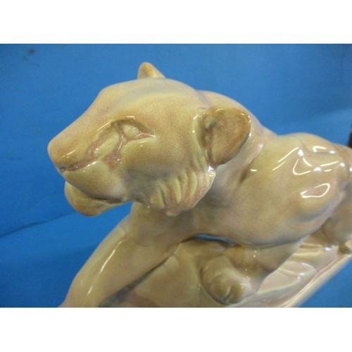 193 - A 1930s French art deco ceramic panther model, approx. length 42cm marked ODYV to base, in good cond... 