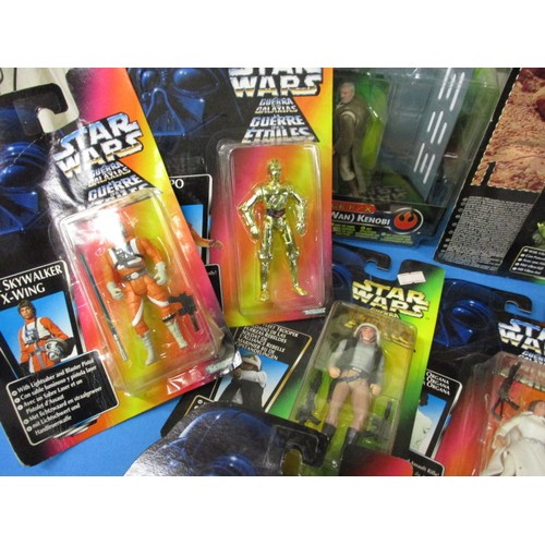 157 - A large quantity of vintage Star Wars figures, most in original blister packs, some folding and mark... 