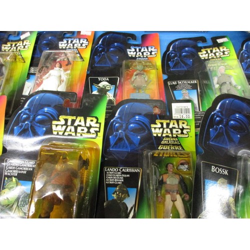 157 - A large quantity of vintage Star Wars figures, most in original blister packs, some folding and mark... 