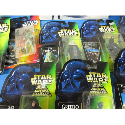 157 - A large quantity of vintage Star Wars figures, most in original blister packs, some folding and mark... 