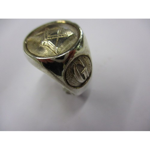 26 - A silver masonic ring, approx. ring size ‘U’ approx. weight 21g in good pre-owned condition