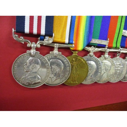 164 - A group of 8 medals to T cpl. 343841 Clifford William Moreton R.E. on mounted frame to include photo... 