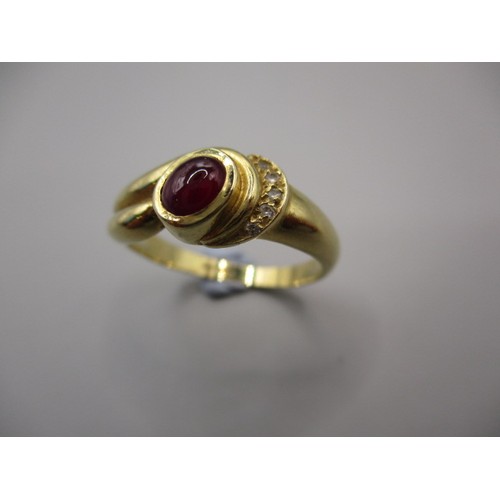 4 - An 18ct yellow gold ring with central cabochon ruby? Approx. ring size ‘P’ approx. weight 5.2g in go... 