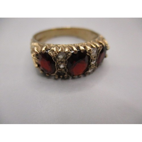 16 - A vintage 9ct yellow gold ring, set with 3 garnets, approx. ring size ‘O ½ ‘ approx. weight 4.9g in ... 