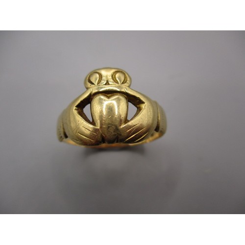 19 - An 18ct yellow gold claddagh ring, approx. ring size ‘U’ approx. weight 5.2g having some misshaping ... 