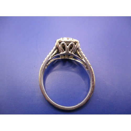 33 - A 9ct white gold and diamond cocktail ring, approx. ring size ‘L’ approx. weight 2.5g in good pre-ow... 